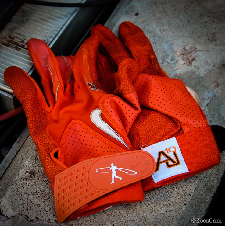 orange batting gloves