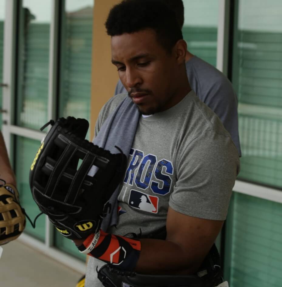 Tony Kemp Selecting a Wilson Glove