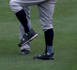 What Pros Wear: Mookie Betts’ Jordan 4 Cleats - What Pros Wear