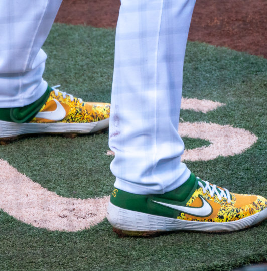 green and gold baseball cleats